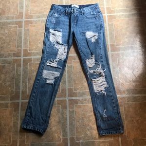 One x oneteaspoon ripped legged jeans